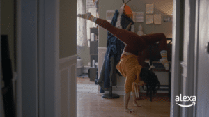 a female dancing in her hallway